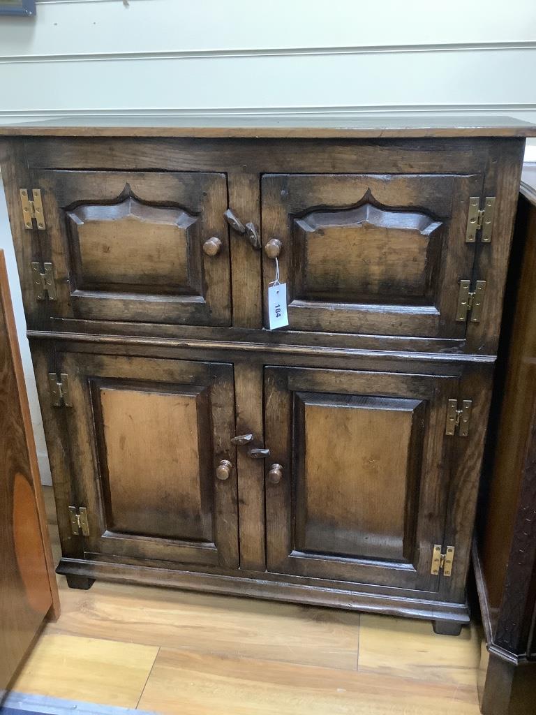 Two 18th century style oak side cabinets, larger width 84cm, depth 32cm, height 92cm